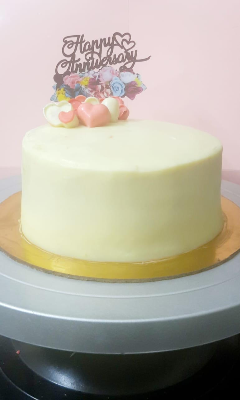 Purple tier cake with gold accents — anniversary and engagement cakes Hyderabad