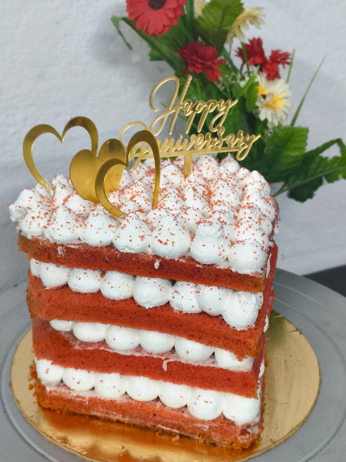 Anniversary celebration cake with red raspberry finish — The Cake Stories Hyderabad
