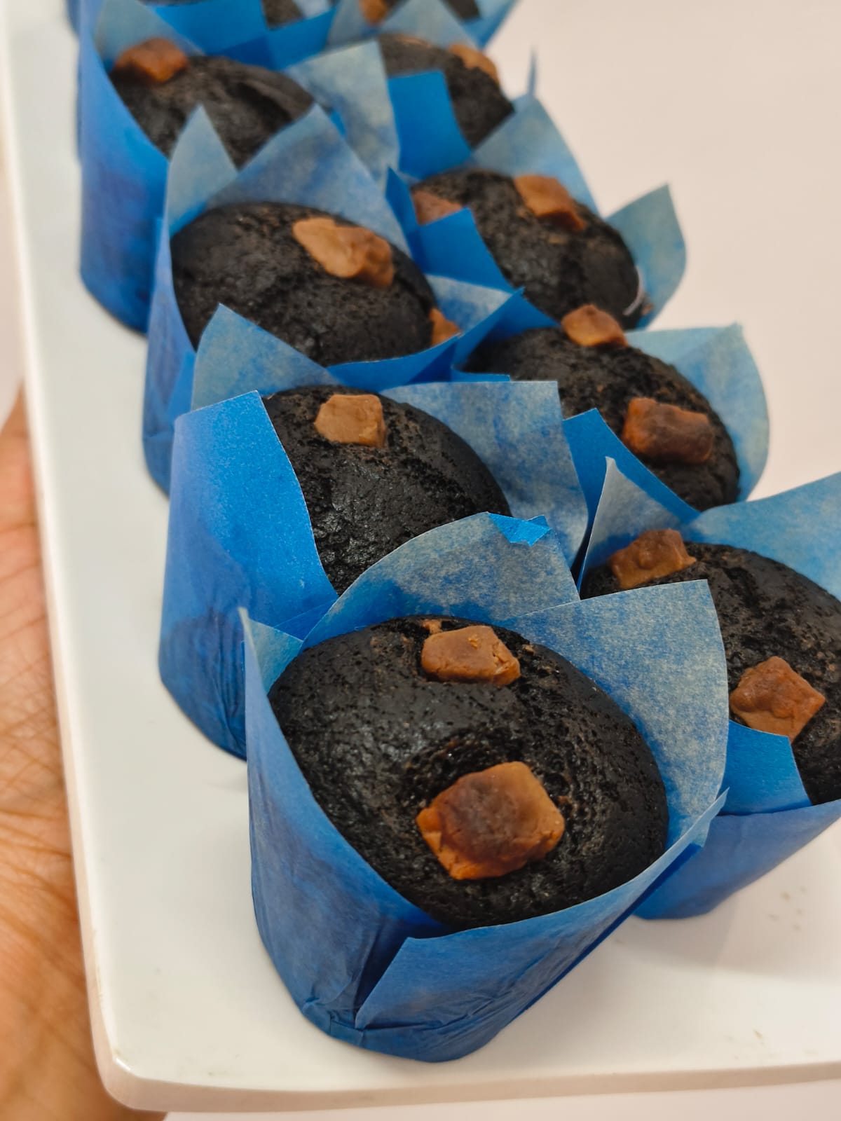 Freshly baked cupcakes with frosting for parties in Hyderabad